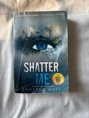 Harper Paperback Book with Deep Teal-Blue Cover